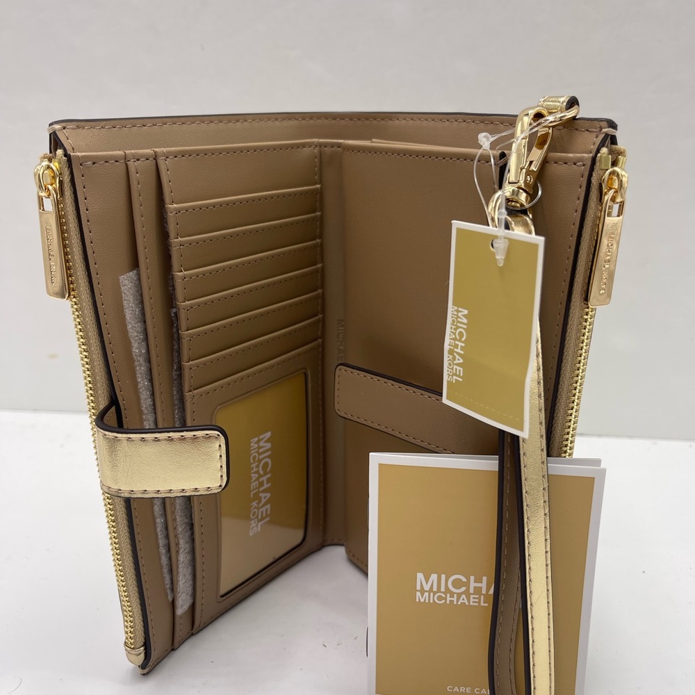 MICHAEL KORS JST Lg Double Zip Signature Logo Wristlet Wallet Phon
Pale Gold
NWT - Picture 5 of 16